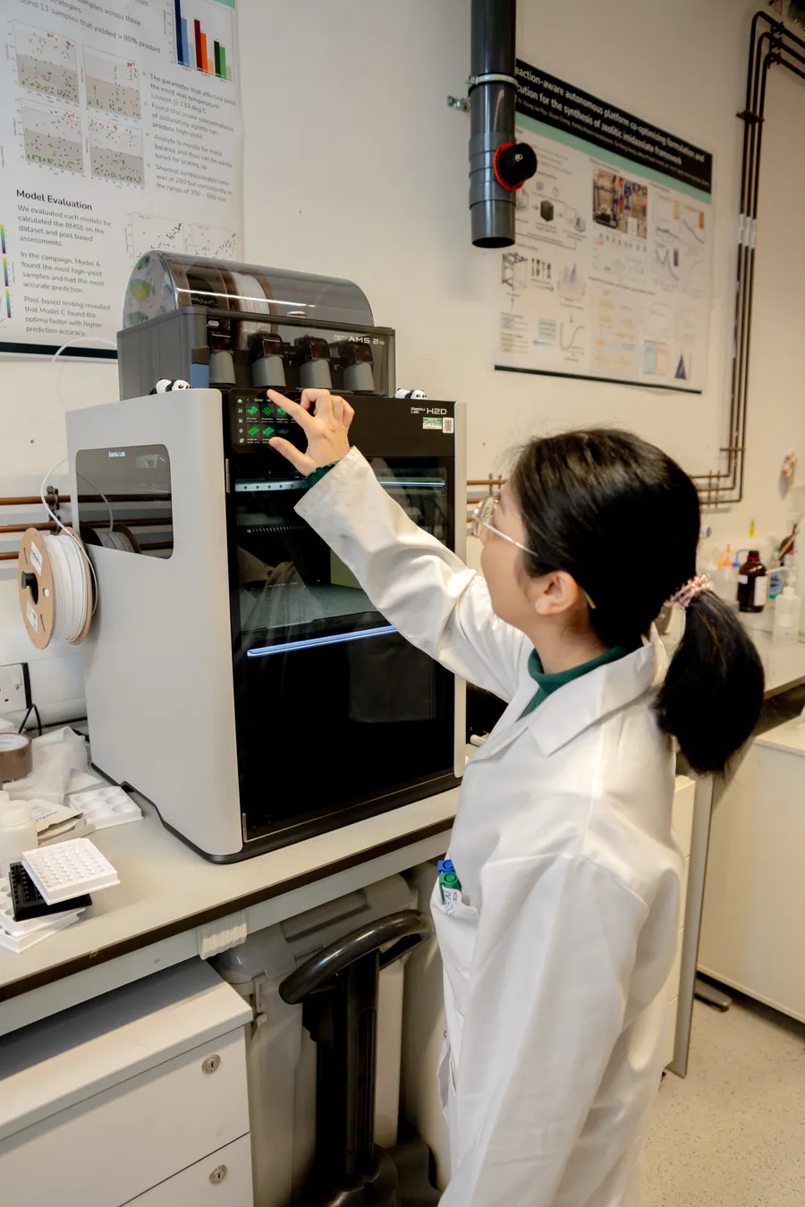 Clara Tamura setting up a print on the Panda 3D printer.